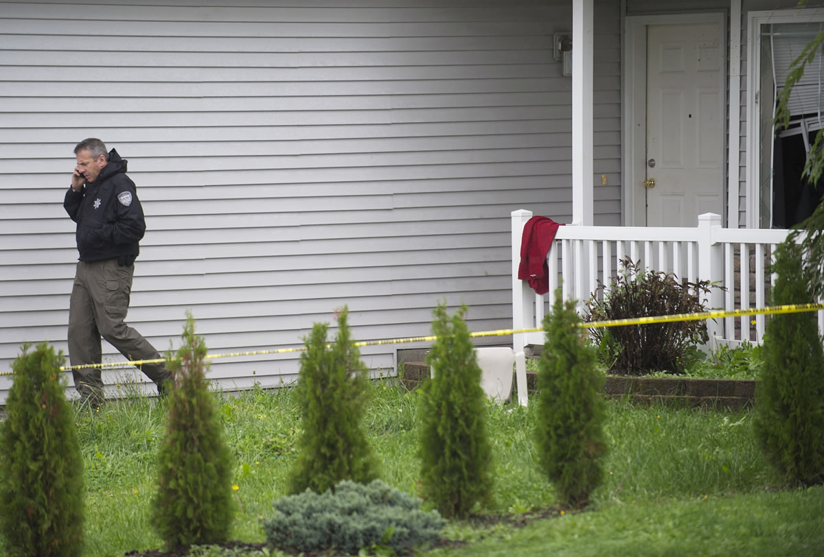 Clark County sheriff's detectives investigate the scene of a fatal stabbing, which was reported just after 4 a.m. on Saturday at 8707 N.E. 89th Ave.