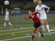 Prairie midfielder Natalie Whitesel (36) and Camas winger Amanda Shi compete for the ball during Camas' 3-0 non-league victory over the Falcons on Tuesday.