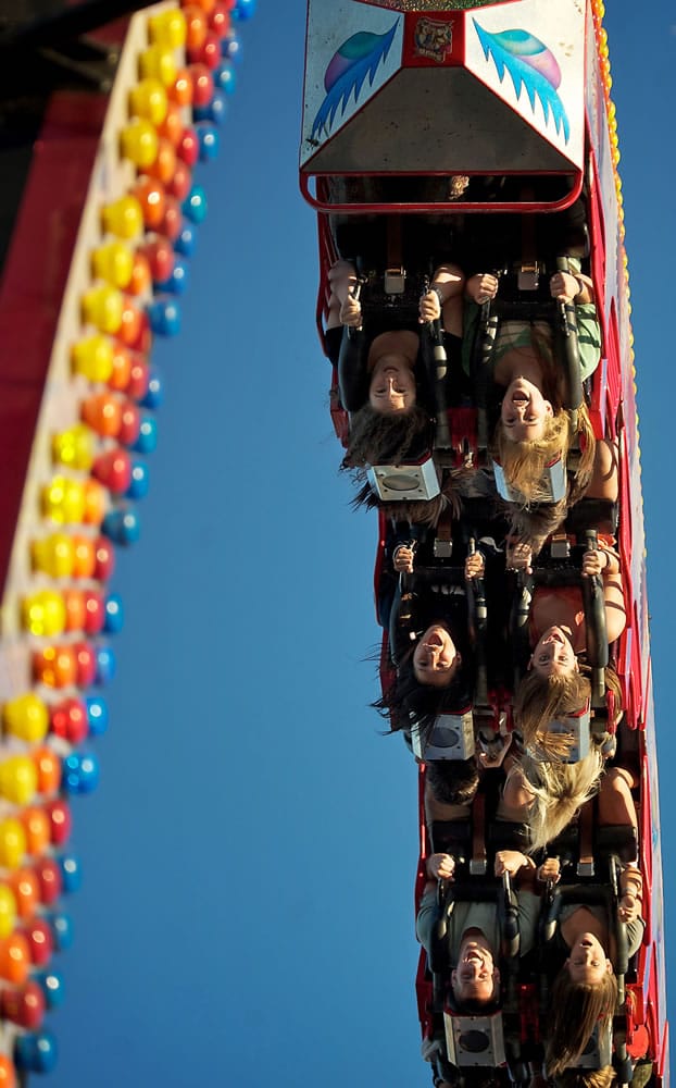 Fairgoers take a spin on the Ring of Fire at the Clark County Fair on Aug.