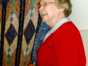 Amboy: Barbara Hagedorn stands next to a quilt she won from the North Clark Historical Museum's  quilt raffle during the annual Community Celebration Honoring Veterans on Nov.