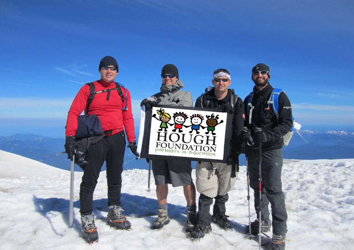 Port of Vancouver employees Todd Coleman, from left, Jonathan Eder, Matt Graves and Phil Martello climbed to the summit of Mount Adams on their Hike for Hough.