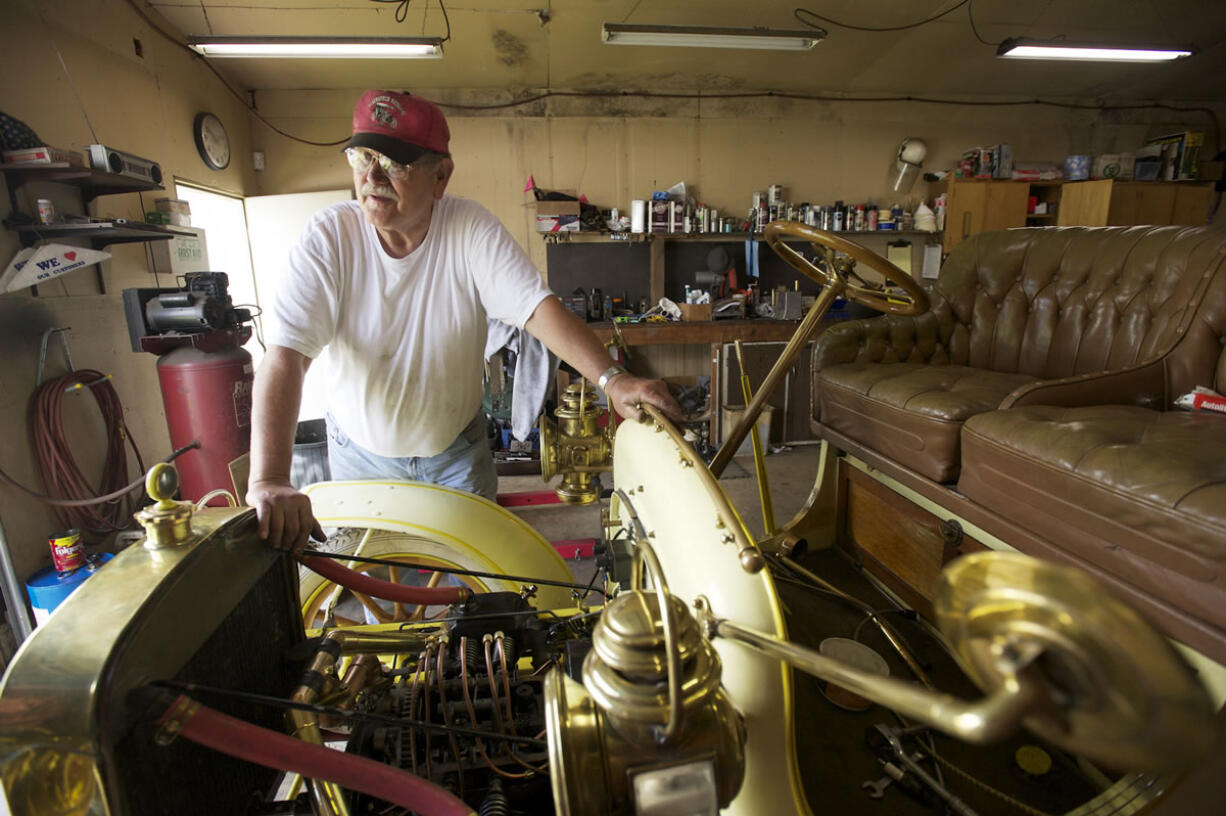 Frank Hurley works this month on his 1907 Cartercar.