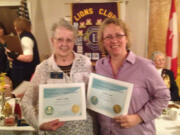 Hudson's Bay: Fort Vancouver Lions Club members Helen Sutfin, left, and Dotty Scott each hold the International President's Certificate of Appreciation that they received at the Multiple District Spring Conference on March 9.