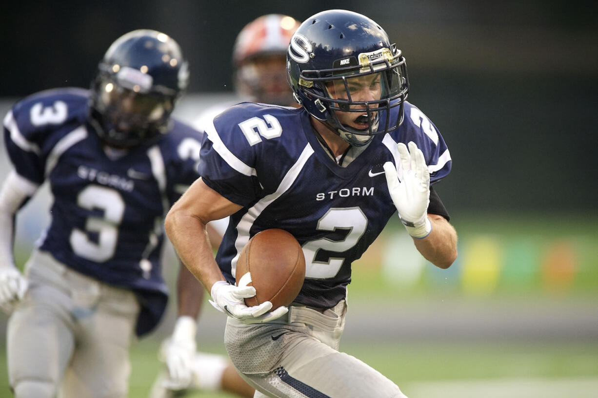 Jacob Dennis, 2, of Skyview High School scores a touchdown on a pass play against Lakes High School in a game at Kiggins Bowl Friday September 14, 2012.