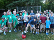 Arnada: The Hough Shazamrox, left, and Arnada Armada stand side-by-side following their July 25 kickball match.