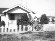 Carol Rose rides her bike near her Aberdeen house in the heyday of drive-in theaters.