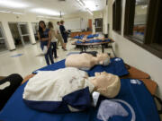 CPR mannequins are among the equipment in the nursing station geared to provide hands-on learning opportunities to students at Henrietta Lacks Health and Bioscience High School, nicknamed HeLa High.