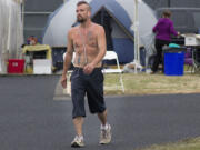 Tyler Schroeder, 25, of Bonney Lake walked more than 42 miles in 24 hours during the Relay for Life of Vancouver at Columbia River High School.