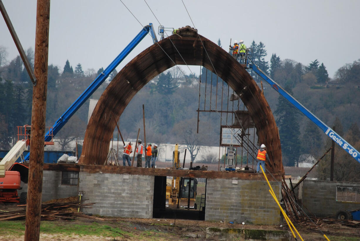 The Port of Vancouver's contractor, I&amp;E Construction of Clackamas, Ore., dismantled several large barns at the Rufener farm to make room for a wetland bank and an industrial park.