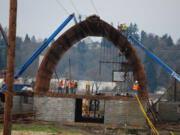 The Port of Vancouver's contractor, I&amp;E Construction of Clackamas, Ore., dismantled several large barns at the Rufener farm to make room for a wetland bank and an industrial park.