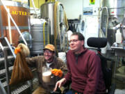 Jeanette Muck
Hazel Dell home brewer Ron Muck, right, and Chris Spollen from Amnesia Brewery use juniper berries and star anise to make beer April 9 at the Portland brewery.