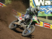 Ryan Villopoto races ahead of the field in the 450 class at the Lucas Oil Pro Motocross Championships in Washougal on Saturday.