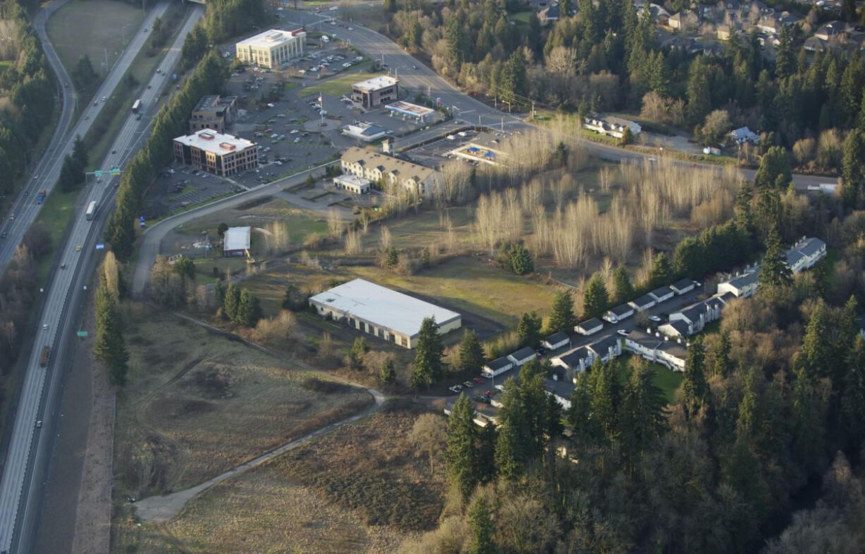 Wal-Mart Stores Inc. has put out bids to have part of its 14-acre Salmon Creek site cleared of two vacant buildings at 12923 and 12925 N.E.