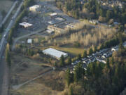 Wal-Mart Stores Inc. has put out bids to have part of its 14-acre Salmon Creek site cleared of two vacant buildings at 12923 and 12925 N.E.