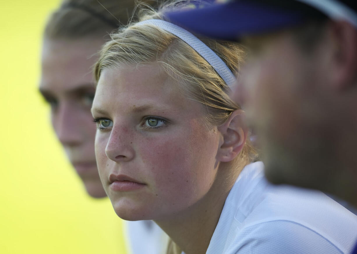 After Columbia River takes a commanding lead against Washougal Madison Reynolds gets a rest on the bench at Jason Lee Middle School on Thursday September 12, 2013.