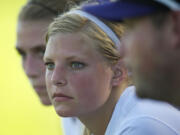 After Columbia River takes a commanding lead against Washougal Madison Reynolds gets a rest on the bench at Jason Lee Middle School on Thursday September 12, 2013.