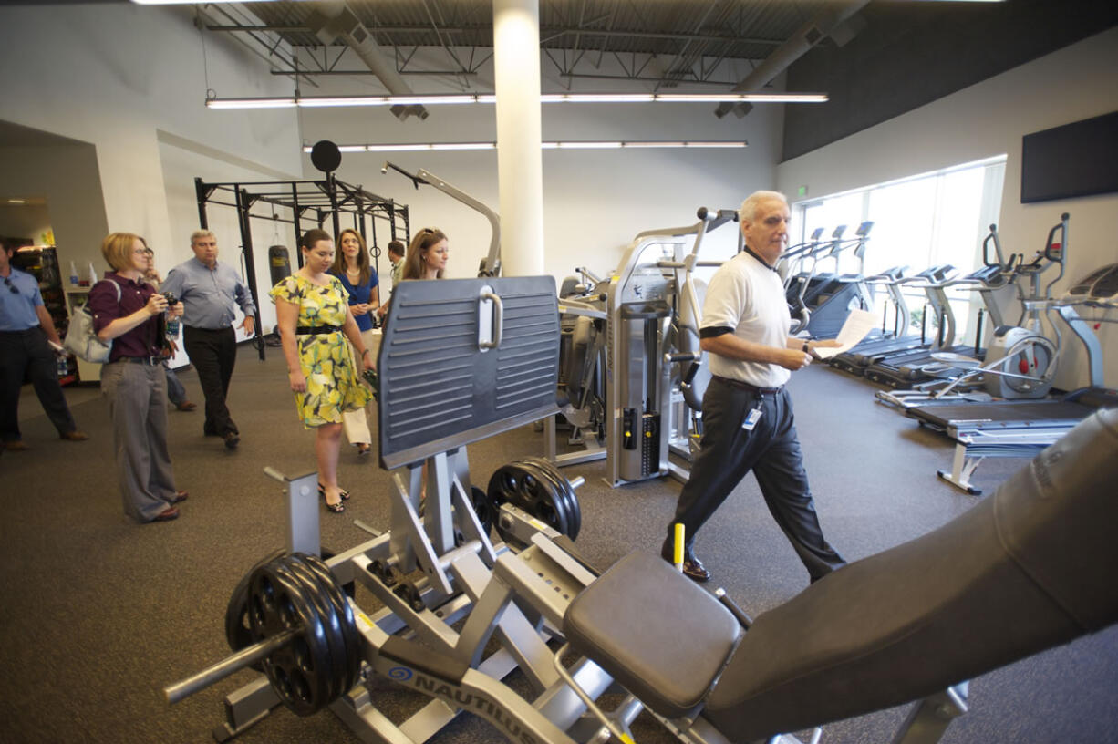 Nautilus CEO Bruce Cazenave leads a tour of Nautilus' new facility following a ribbon-cutting ceremony.