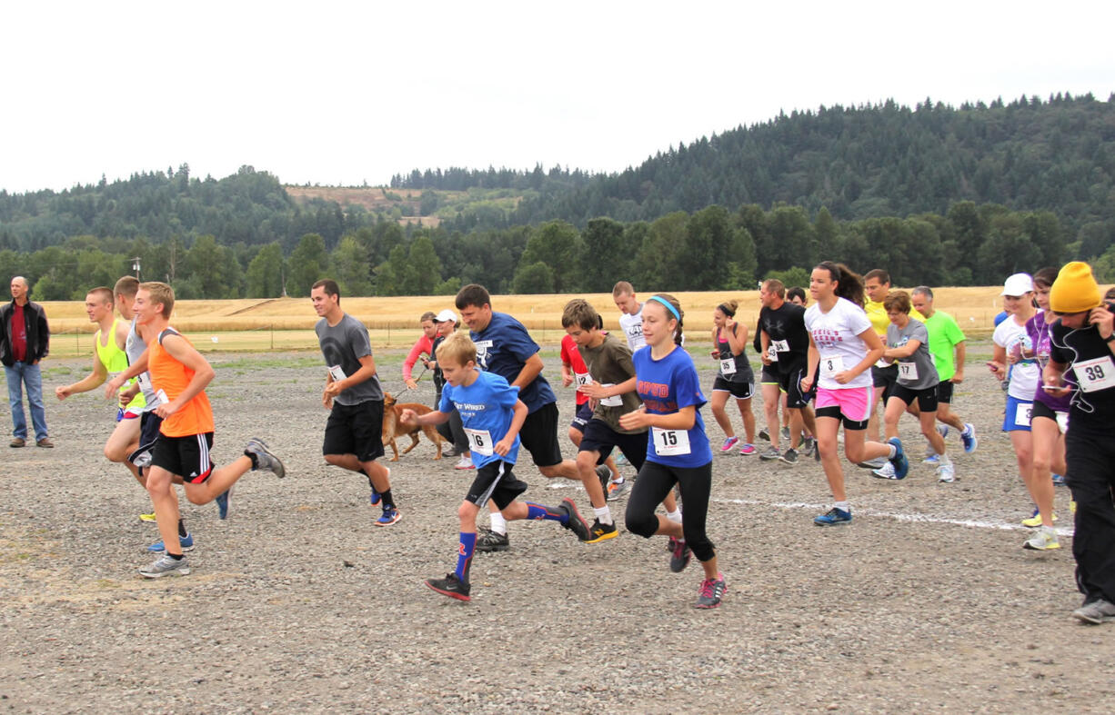 Woodland: Racers run to raise money for the Clark County Food Bank during the Race Against Hunger event held July 27 at Holland America Bulb Farms in Woodland.