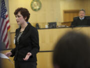 Ridgefield High School senior Phoebe Askelson delivers an opening statement in a mock domestic terrorism trial.