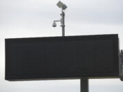 A state variable message sign stands blank Tuesday for drivers on westbound state Highway 14 near East Evergreen Boulevard.