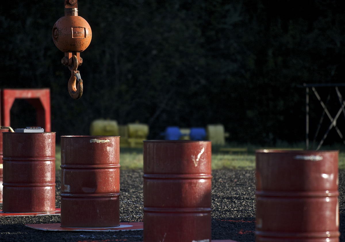 A &quot;headache ball&quot; is carefully moved around 55-gallon drums during the Crane Operator Rodeo on Saturday at Woodland's Industrial Training International.