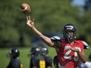 At 6-foot-4, Hudson's Bay quarterback T.J.