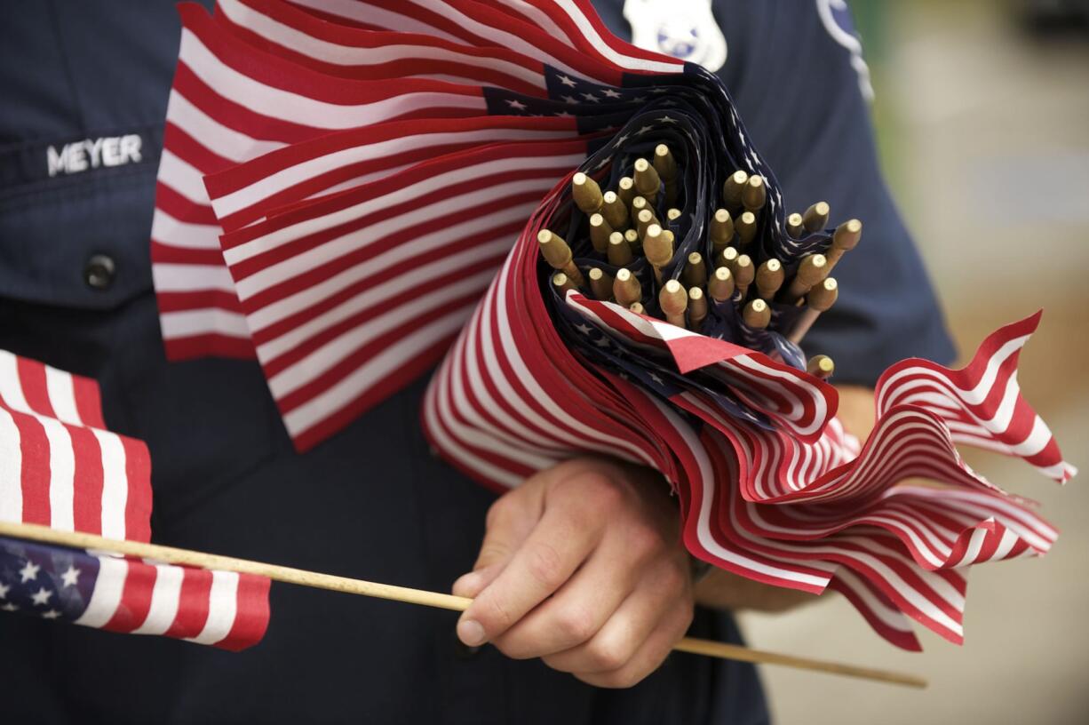 Firefighters planted 304 flags at the Hockinson station.