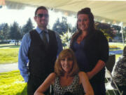 Luke Ashe attends a July wedding with his sister, Sarah Ashe, right, and mother, Gwenn Ashe.