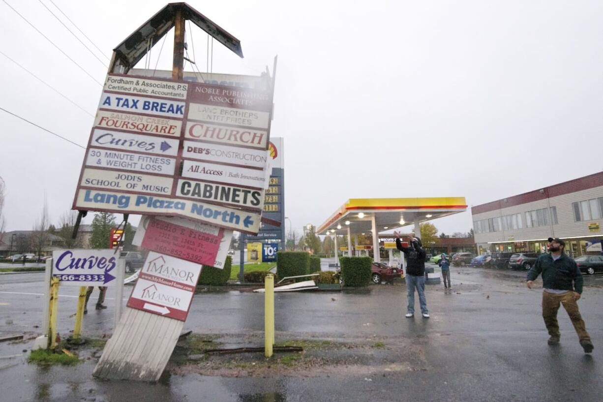 High winds badly damaged a business sign in Salmon Creek on Monday.