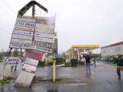 High winds badly damaged a business sign in Salmon Creek on Monday.