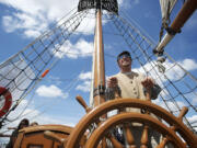 Chief Mate Kent Gorham takes the wheel of the Hawaiian Chieftain.