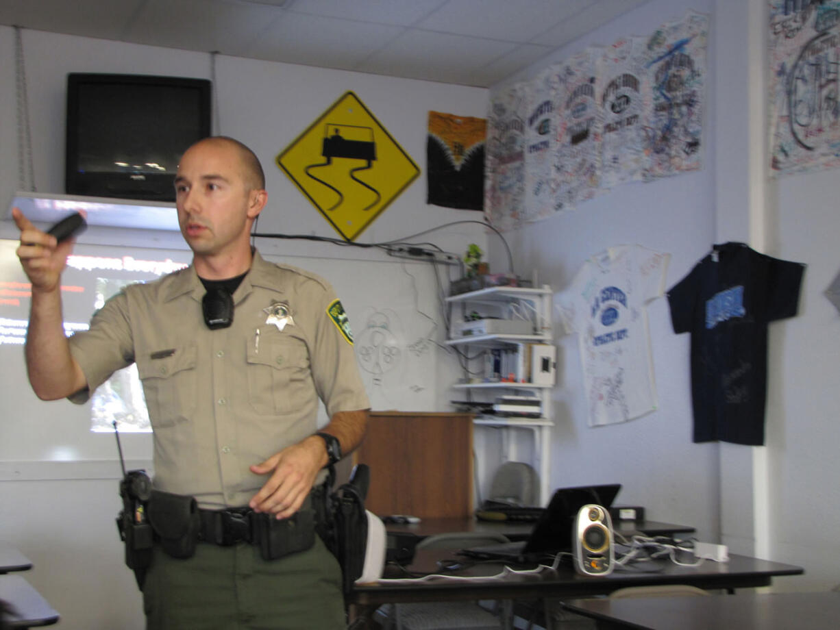 Deputy Chris Luque with the Clark County Sheriff's Office gives a multimedia presentation at Big John's Driving School on impaired driving.