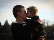 Kisses for Daddy.  Pictured: Trevor McGraw, 21 and Treylon McGraw, 2, of La Center. Submitter's comments: &quot;We were at Horseshoe Lake playing and taking pictures with Mommy on the day this picture was taken.