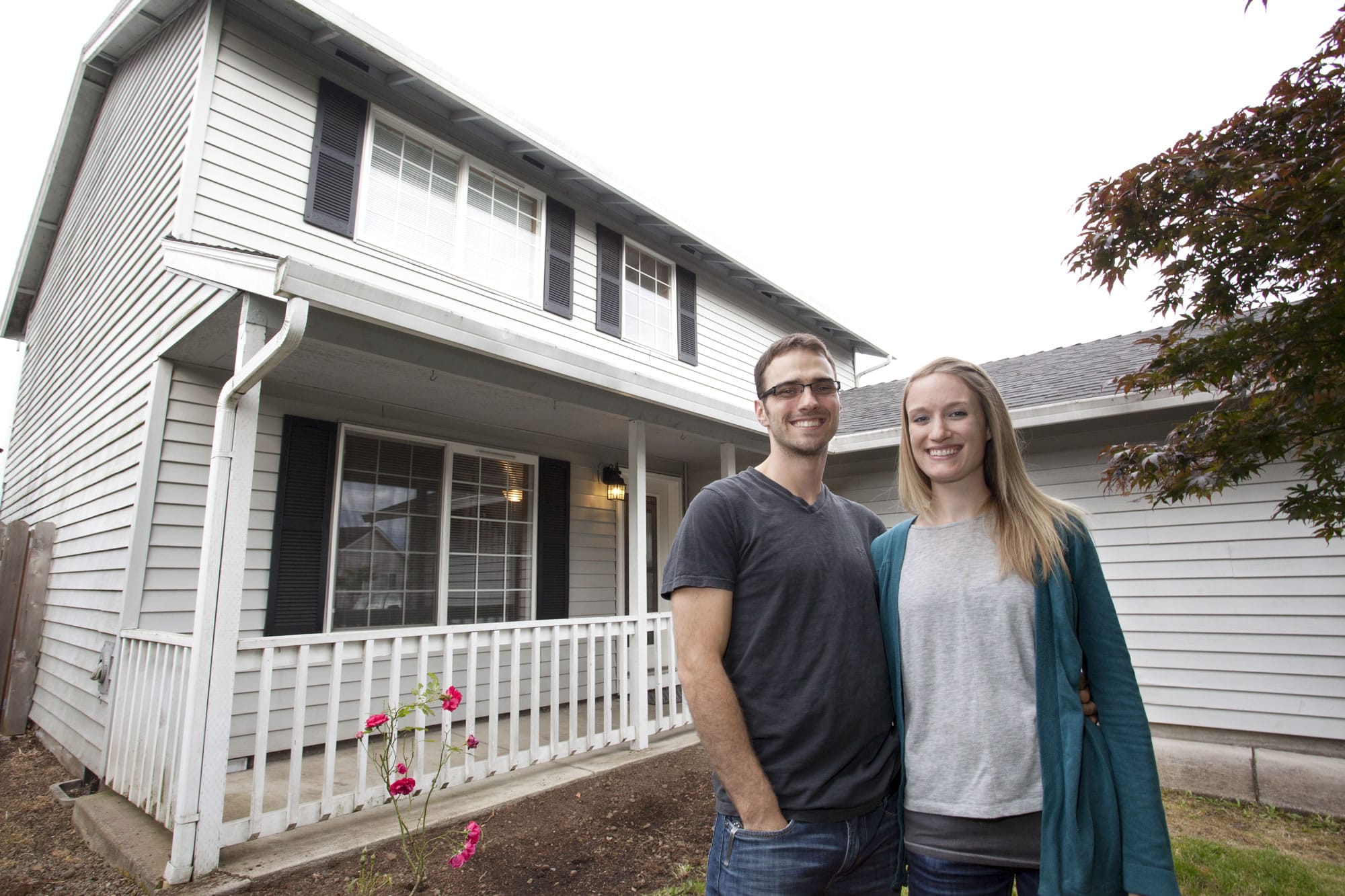 Hans and Amy Vierck had to install flooring in the home they wanted to buy on a short sale before their bank would approve a loan.