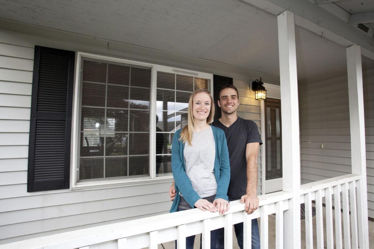 Amy and Hans Vierck had to install flooring in the house they wanted to buy on a short sale before their bank would approve a loan.