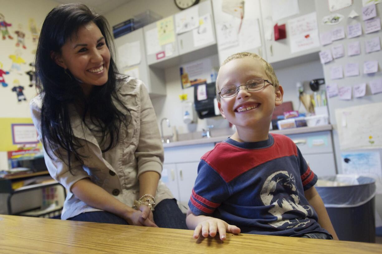 Kindergarten teacher Toni Brammer saved Hunter Schofield, 6, from choking on Wednesday.