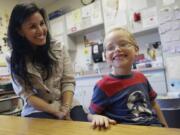 Kindergarten teacher Toni Brammer saved Hunter Schofield, 6, from choking on Wednesday.