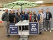 Hudson&#039;s Bay: Representatives from Sigma Design with Fort Vancouver Regional Library District employees, from left: Jay Tucker, Pat Scranton, John Provost, Mark Schoening and Kevin Carbone, of Sigma Design, Janet Alder, Fort Vancouver Library, Luke Jones, Sigma Design, Sue Vanlaanen, Amelia Shelley and Jeanne Heikkinen, of the library district, and Bill Huseby and Dean Van, Sigma Design.