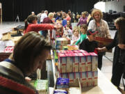 East Vancouver: Volunteers from the Evergreen School District Foundation Pantry and Life Point Church packed up nearly 350 boxes of food for students in need to take home over winter break.