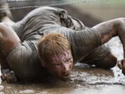 More than five thousand participants compete in the Spartan Race, a four-mile long extreme obstacle course, held at the Washougal MX Park, Saturday, June 16, 2012.