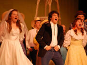 Mountain View: Lauren Vander Aarde, 15, Kyle Barry, 17, and Stacy Hogan, 16, perform in Mountain View High School's production of &quot;Oklahoma,&quot; which opened May 2.