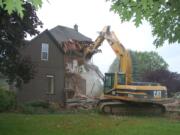 The old Erickson farmhouse is demolished.