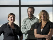 Washington State Opportunity Scholarship recipients, from left, Tracy Larson, Benjamin Griffith and Natasha Trachsel learned Wednesday that their annual award will increase fivefold, from $1,000 to $5,000, next fall.