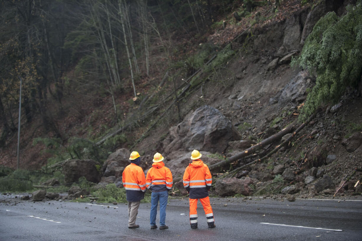 Boulders, trees and dirt slid onto Interstate 5 north of Woodland on Wednesday at about 3 p.m., blocking traffic and stranding travelers.