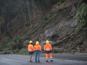 Boulders, trees and dirt slid onto Interstate 5 north of Woodland on Wednesday at about 3 p.m., blocking traffic and stranding travelers.