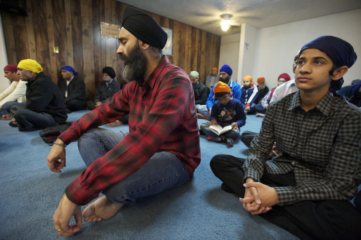 While Sikhism insists that all people are equal, inside the Guru Ramdass Gurdwara temple, women step to the left and men step to the right.