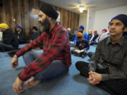 While Sikhism insists that all people are equal, inside the Guru Ramdass Gurdwara temple, women step to the left and men step to the right.