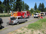 A pickup truck rear-ended a car Wednesday afternoon on East Fourth Plain Boulevard near the Interstate 5 northbound offramp.