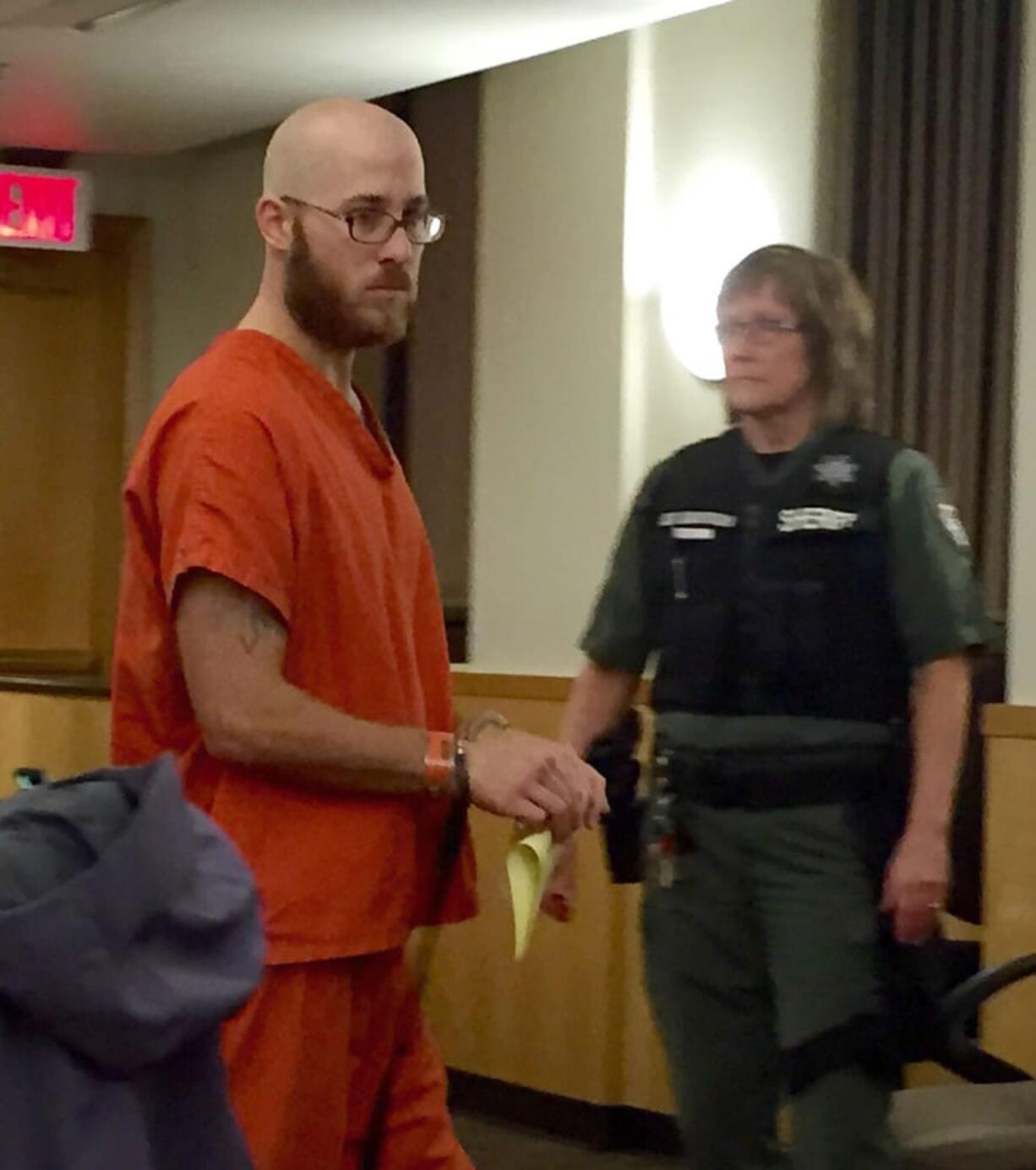 Larch Corrections Center inmate Joseph R. Smith, 27, makes a first appearance Monday in Clark County Superior Court after allegedly attacking a female while on a work crew and attempting to rape her.