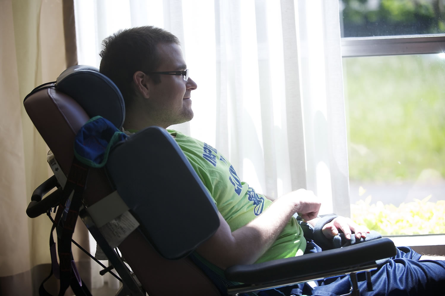 Luke Ashe looks out the window at Pacific Specialty and Rehabilitative Care in Vancouver on Monday. Ashe was found in a coma Jan. 15.